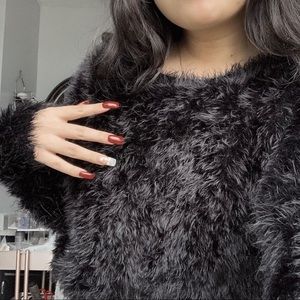 fuzzy black sweater